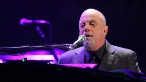 Billy Joel performs his first show of his Madison Square Garden residency, on Monday, January 27, 2014, in New York. (Photo by Greg Allen/Invision/AP)