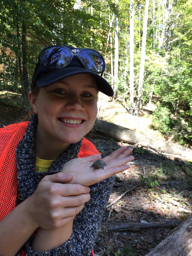 Lily Thompson and a Cope's gray tree frog.