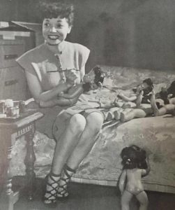 Pioneering cartoonist, Zelda 'Jackie' Ormes with her Patty Jo doll.