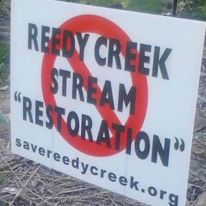 A lawn sign opposing the restoration
