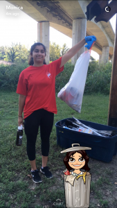 Me, holding the total amount of garbage Monica and I found combined.