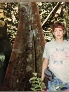 My friend Emily in the Ecuadorian Amazon with a tree with large buttress roots